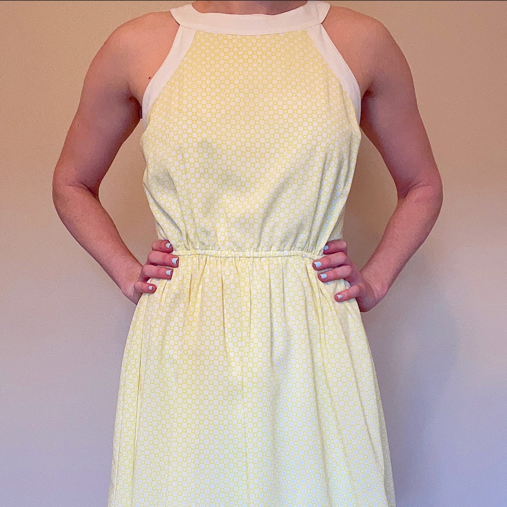 Yellow pattern dress.